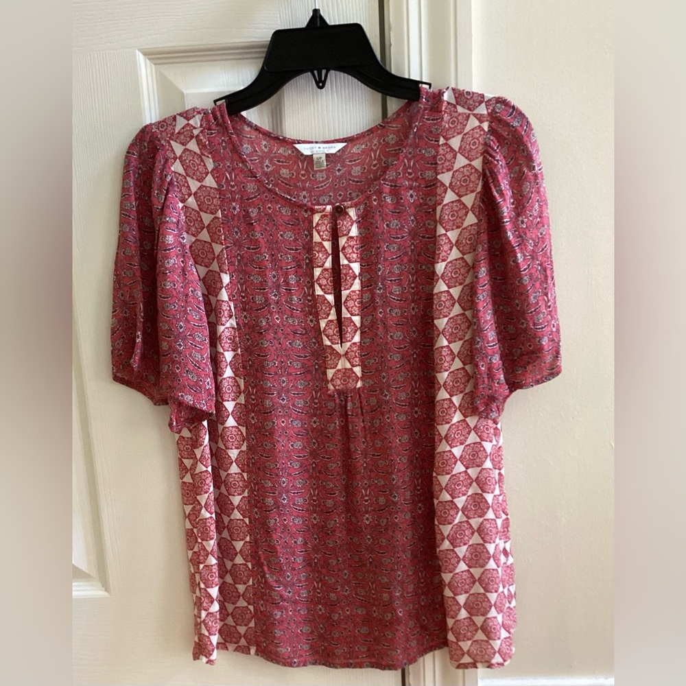 Lucky, Los Angeles , print of cherry red, light cream